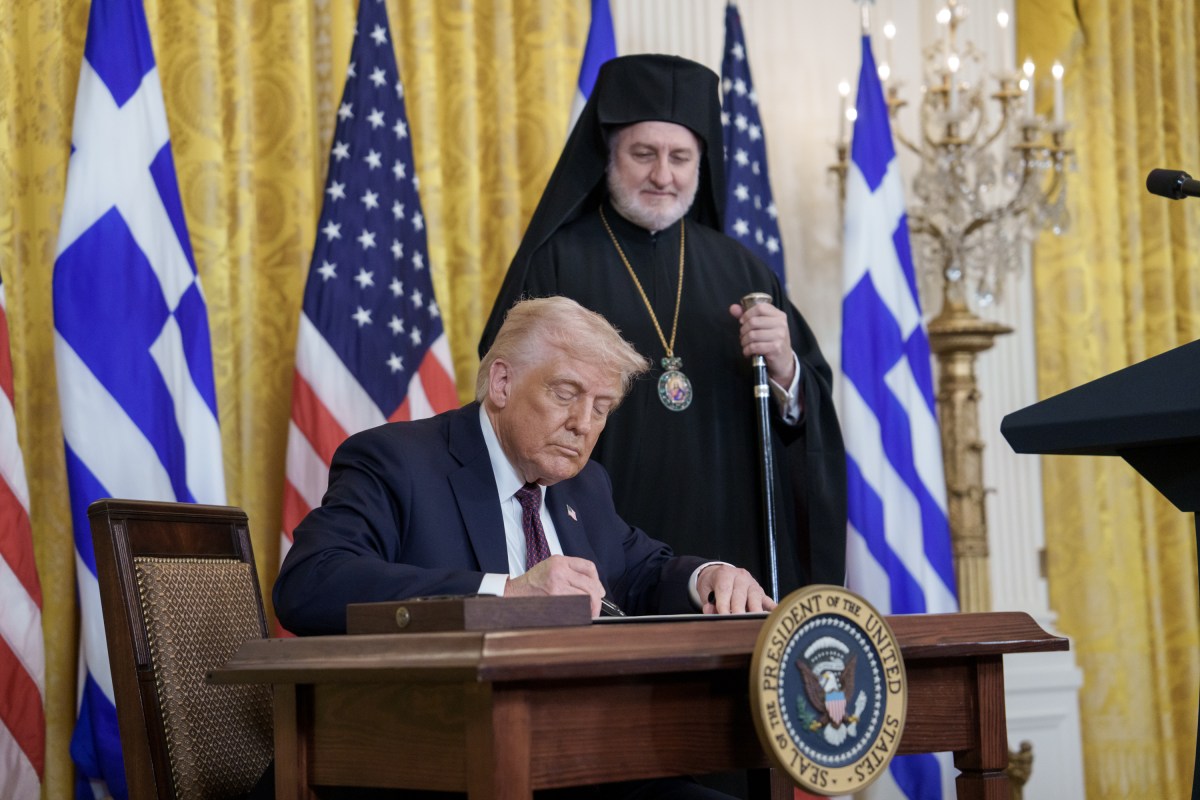 President Donald J. Trump signs a proclamation honoring the 185th anniversary of of Greek Independence during a Greek Independence Day Reception, Monday, March 24, 2025, in the East Room at the White House. (Official White House Photo by Joyce Boghosian)