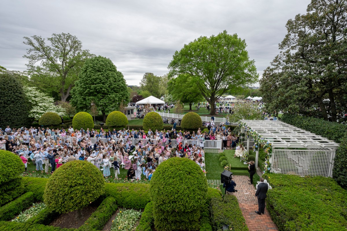 First Lady Melania Trump reads a book at the Reading Nook in the First Ladies Garden during the White House Easter Egg Roll, Monday, April 21, 2025, on the South Lawn.(Official White House Photo by Carlos Fyfe)