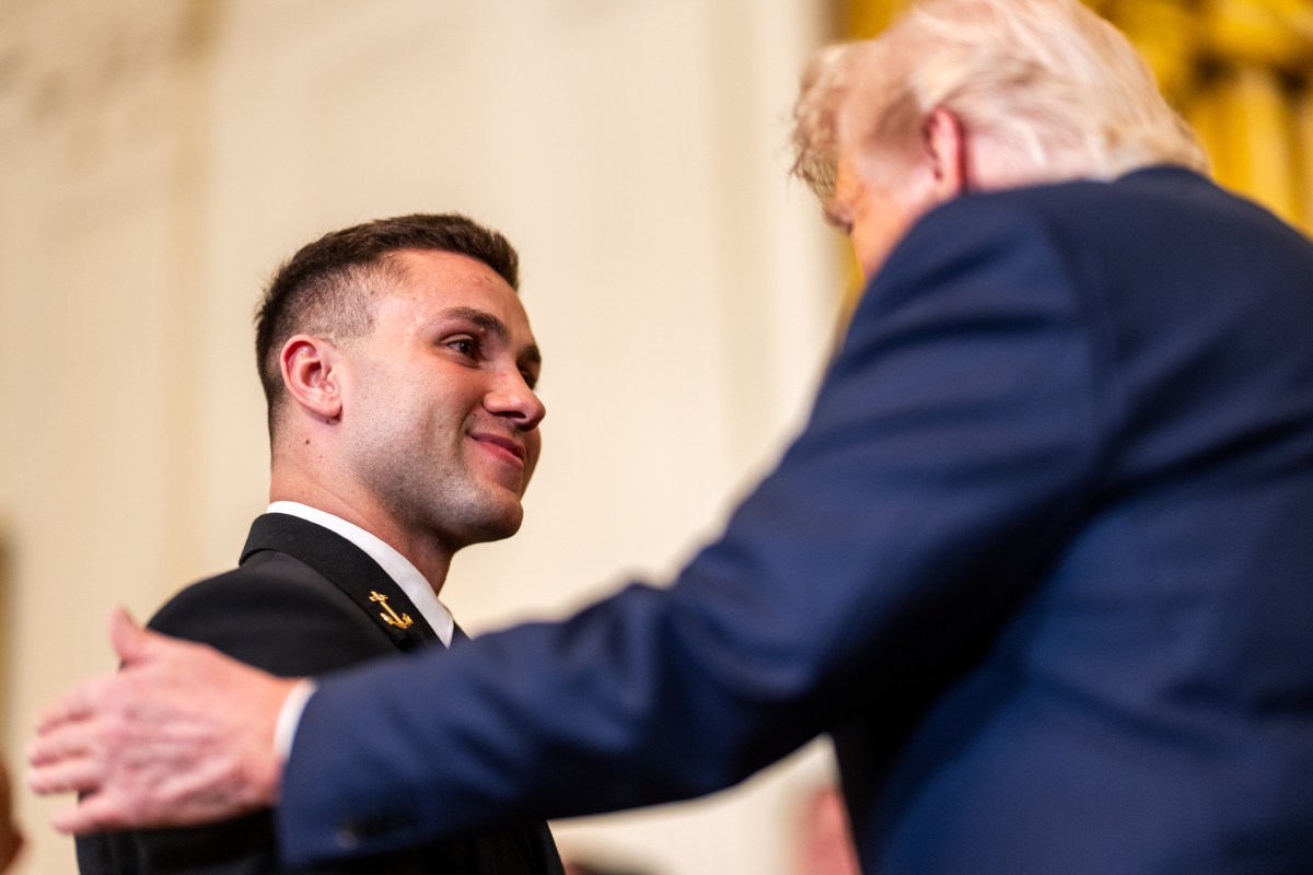President Donald Trump greets members of the Navy Midshipmen football team from the U.S. Naval Academy, Tuesday, April 15, 2025, in the State Dining Room of the White House. (Official White House Photo by Daniel Torok)