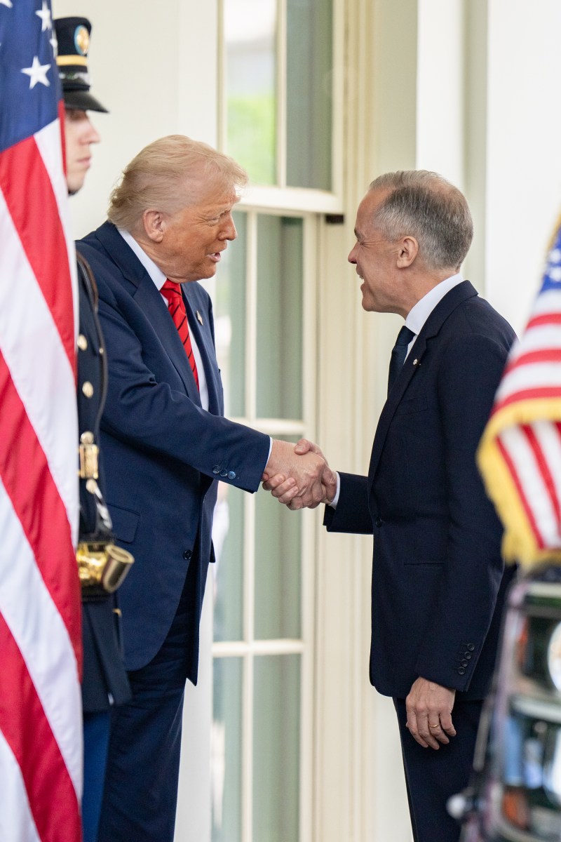 President Donald Trump greets Prime Minister of Canada Mark Carney, Tuesday, May 6, 2025, at the West Wing entrance of the White House. (Official White House Photo by Gabriel B Kotico)