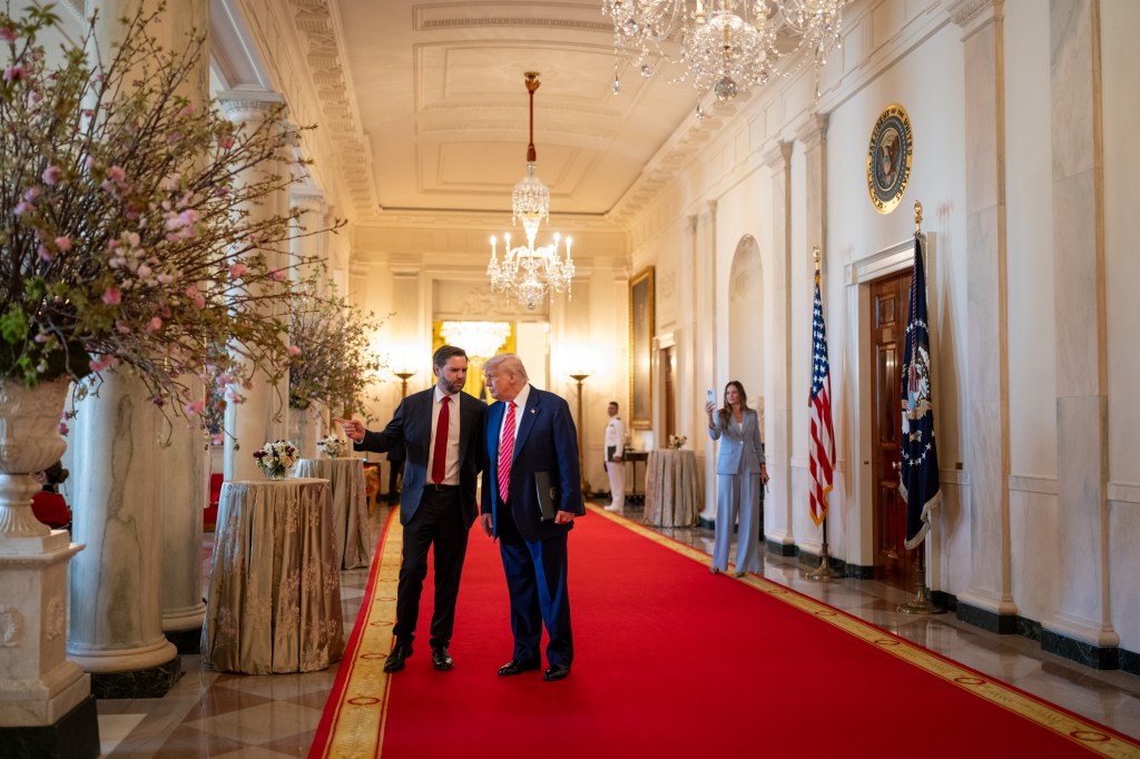 President Donald Trump and Vice President JD Vance talk in the Cross Hall of the White House, Thursday, May 8, 2025. (Official White House Photo by Molly Riley)